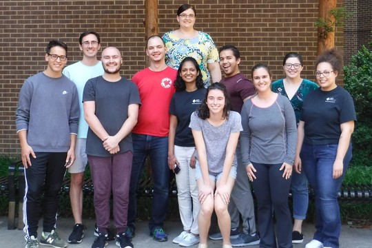 Professor standing with her 2019 Research Group